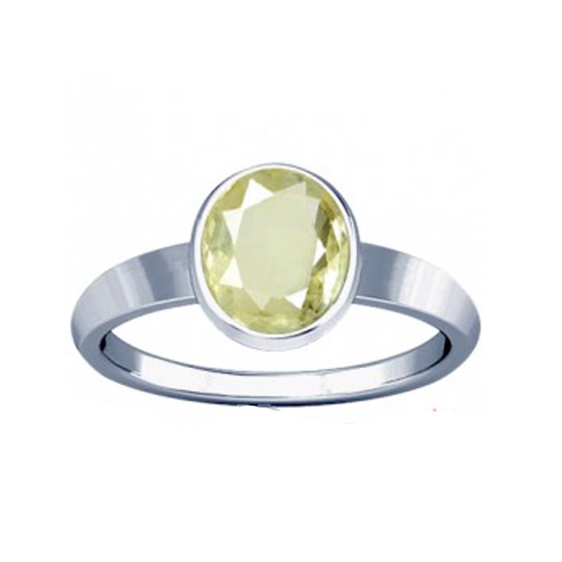 Pukhraj or yellow sapphire set in a stylish gold ring | Anelli con perla,  Anelli, Perle